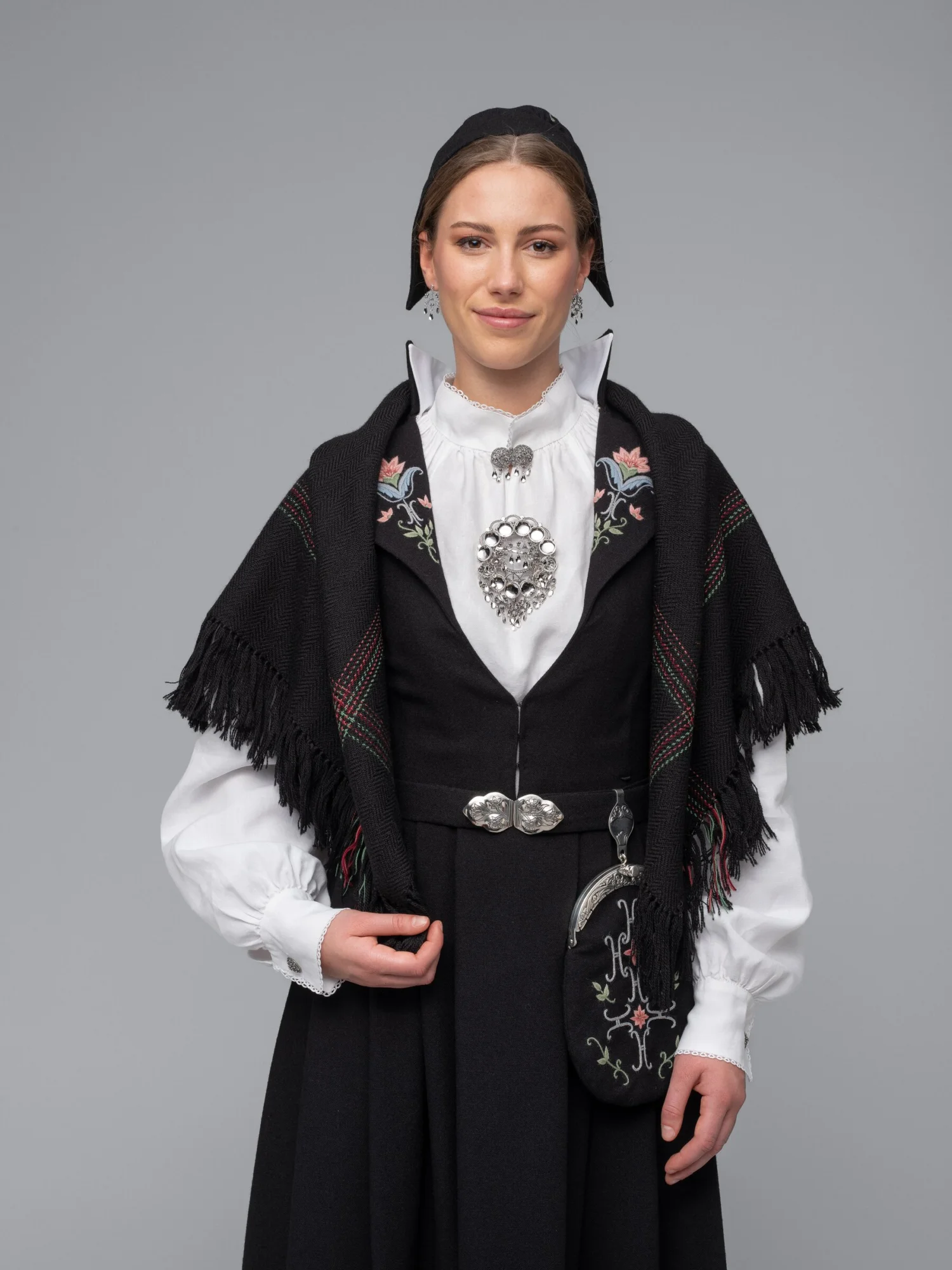 Mansjett og veske